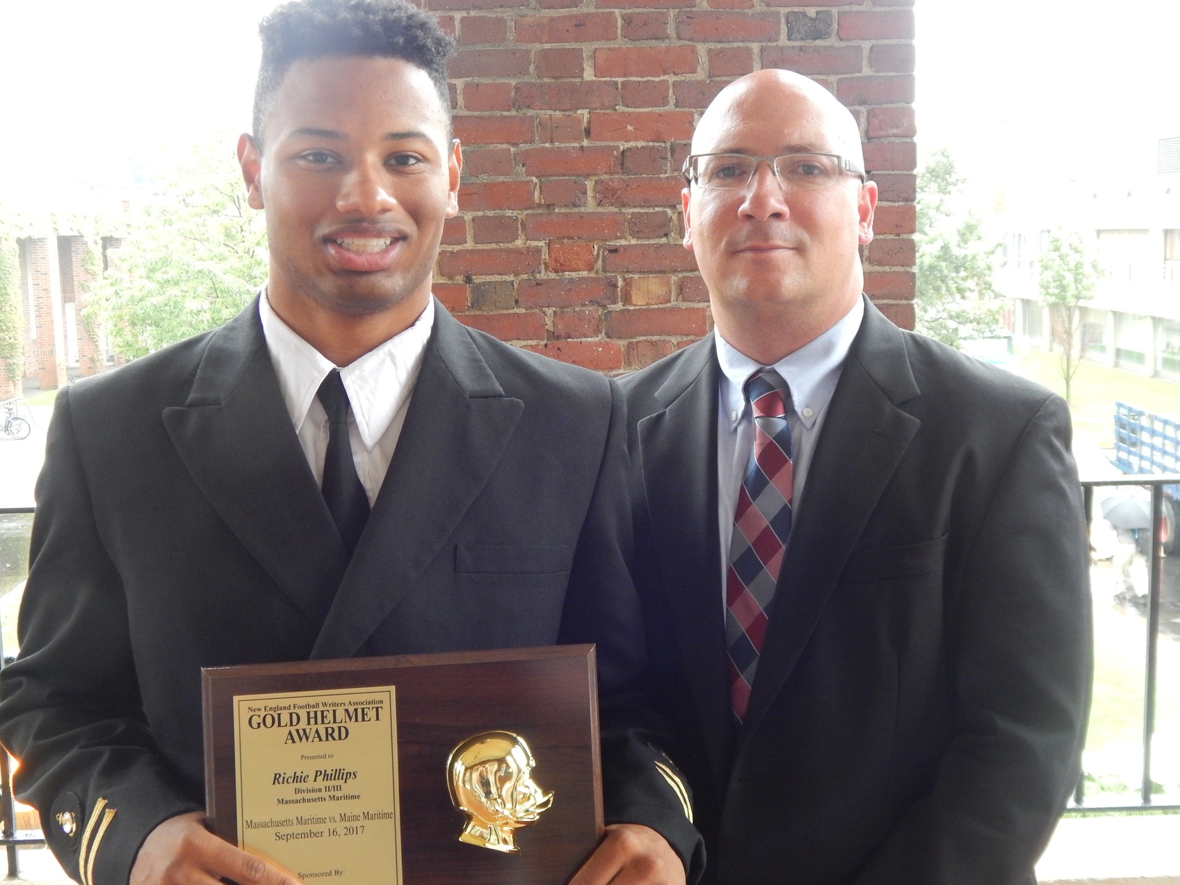 Phillips Receives NEFW Division II/III Gold Helmet Award