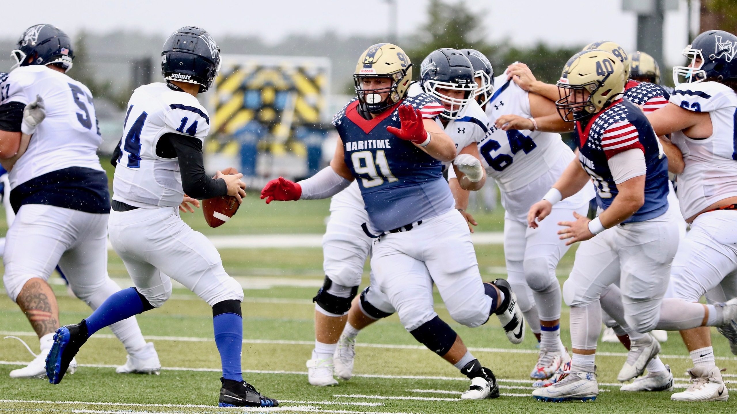 Football: Bucs Clip Owls to Stay Undefeated in Conference